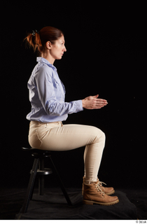 Charity  1 blue shirt casual dressed kneeling white jeans…